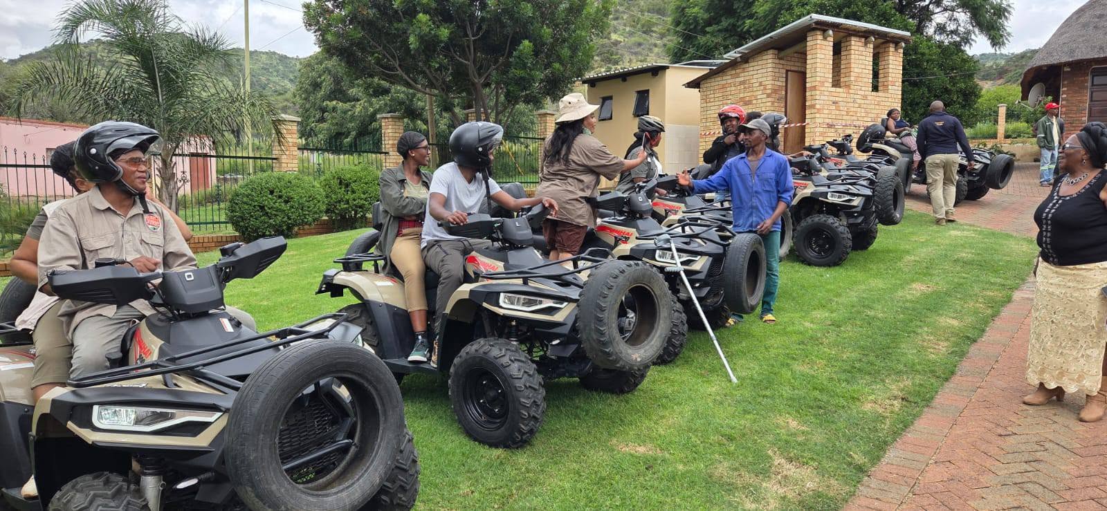 Travellers preparing for a quad biking adventure