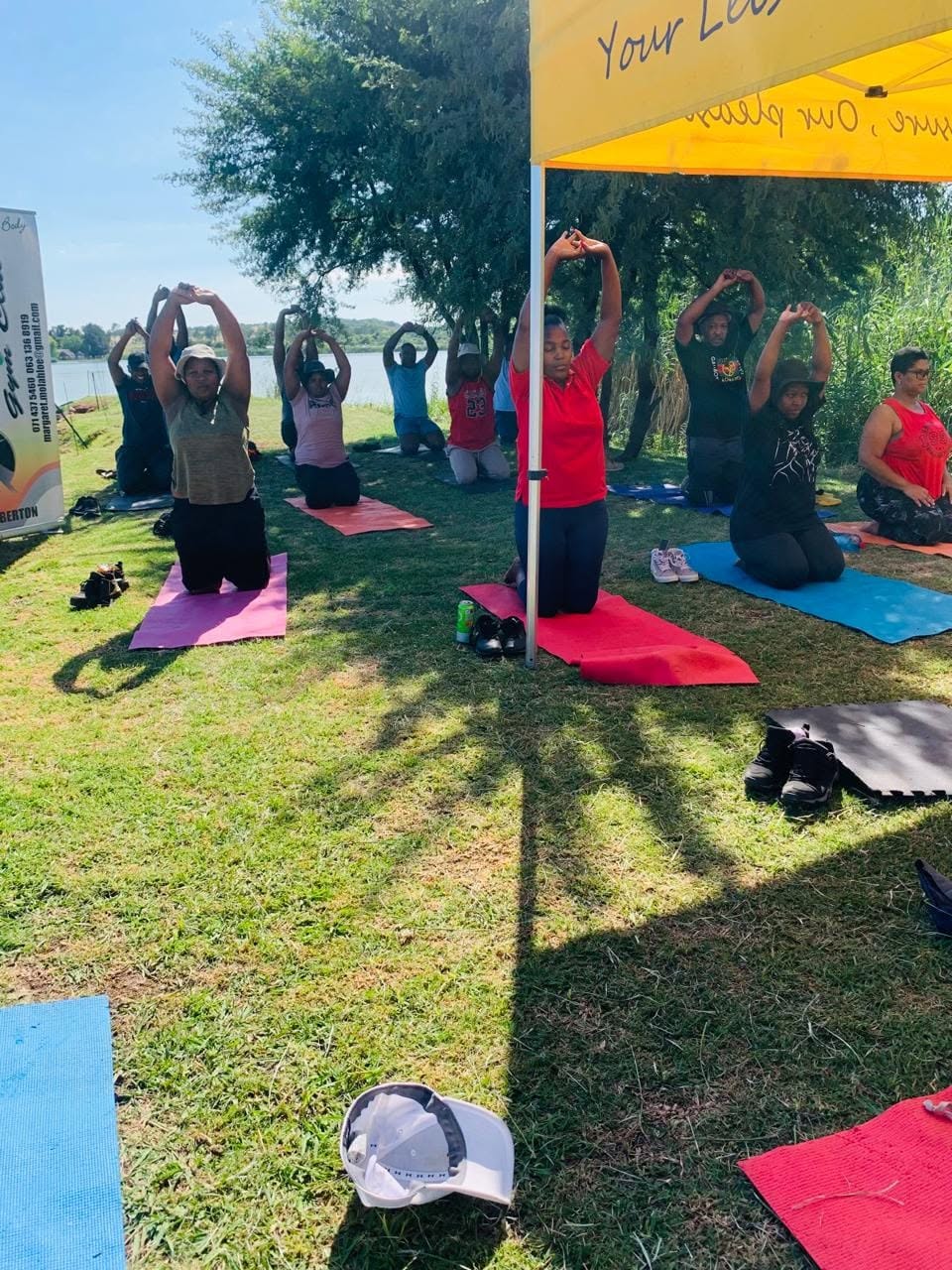 Outdoor yoga and wellness session on grass